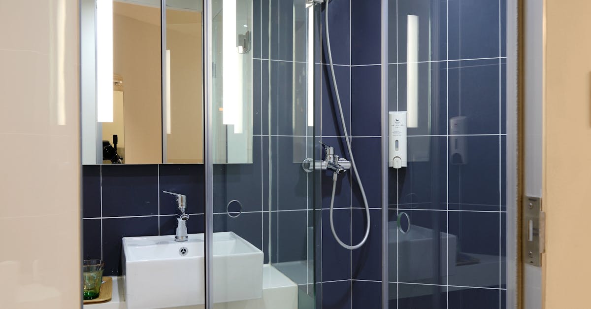 Sleek modern bathroom with a glass shower and contemporary design elements.